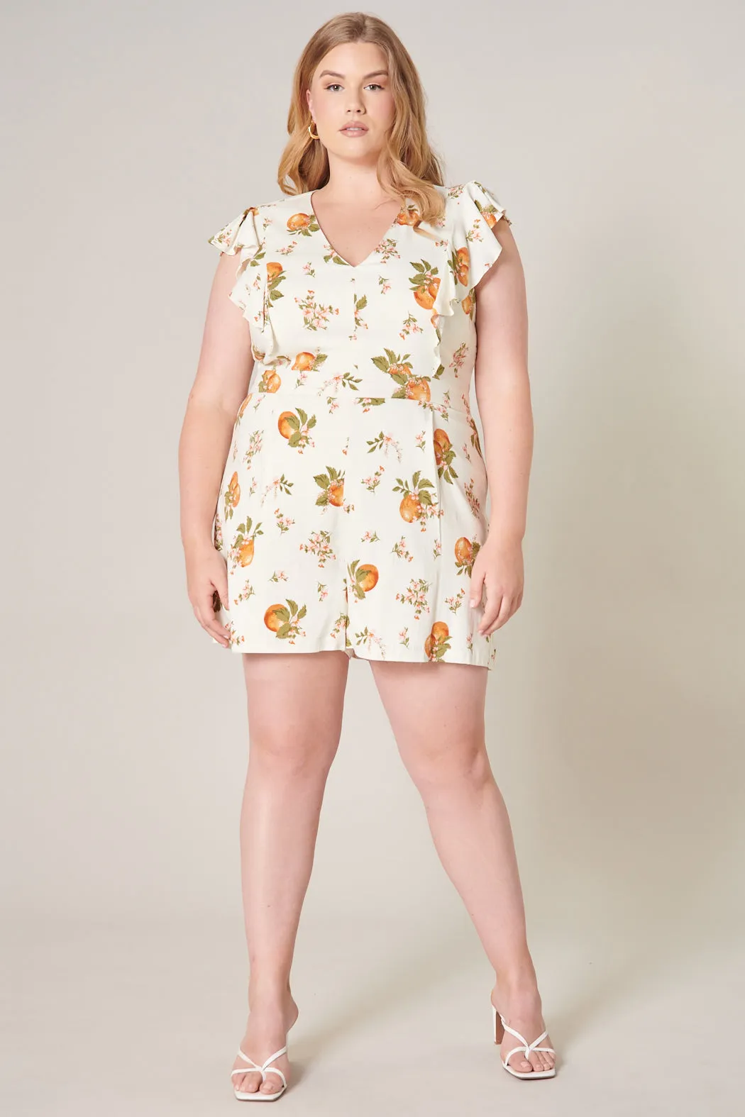 Arancia Ruffle Shoulder Romper Curve