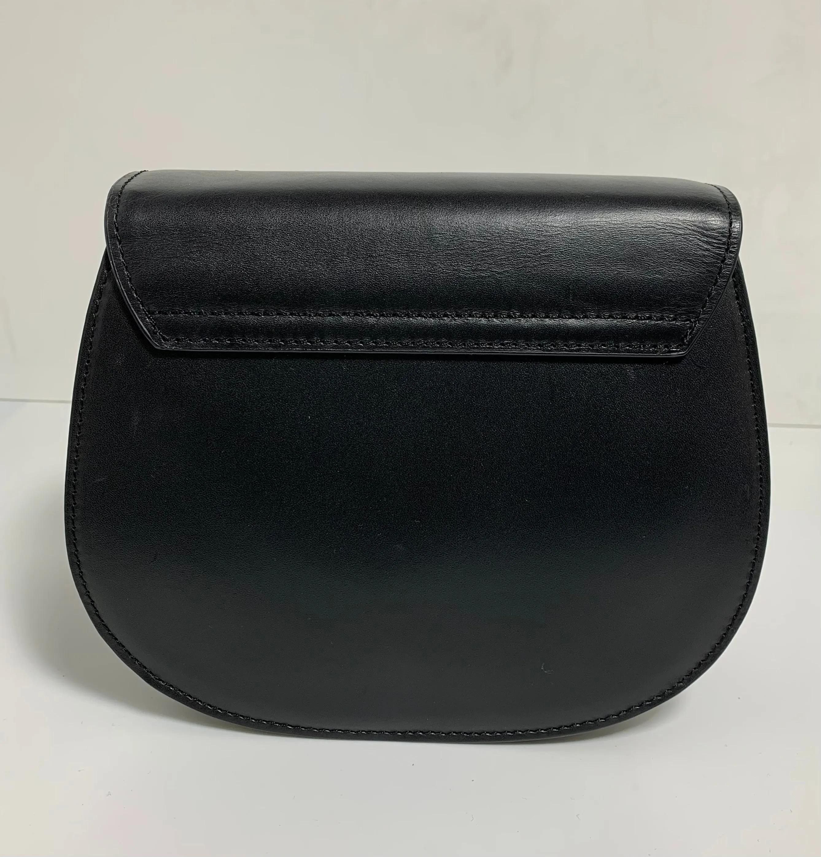 Black leather small crossbody bag with style code FLP5079.