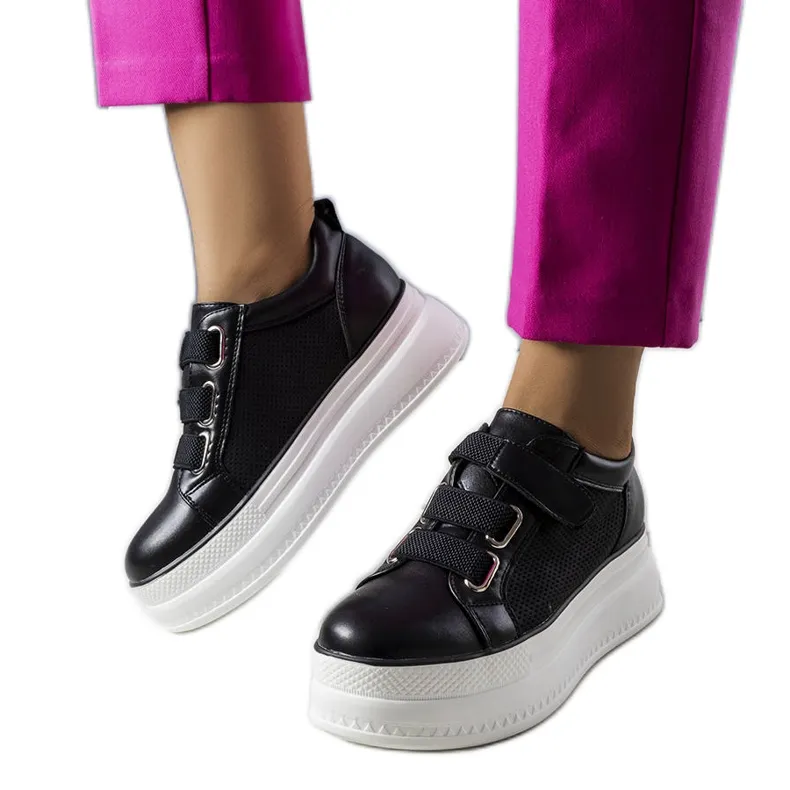 Black platform sneakers from Armina