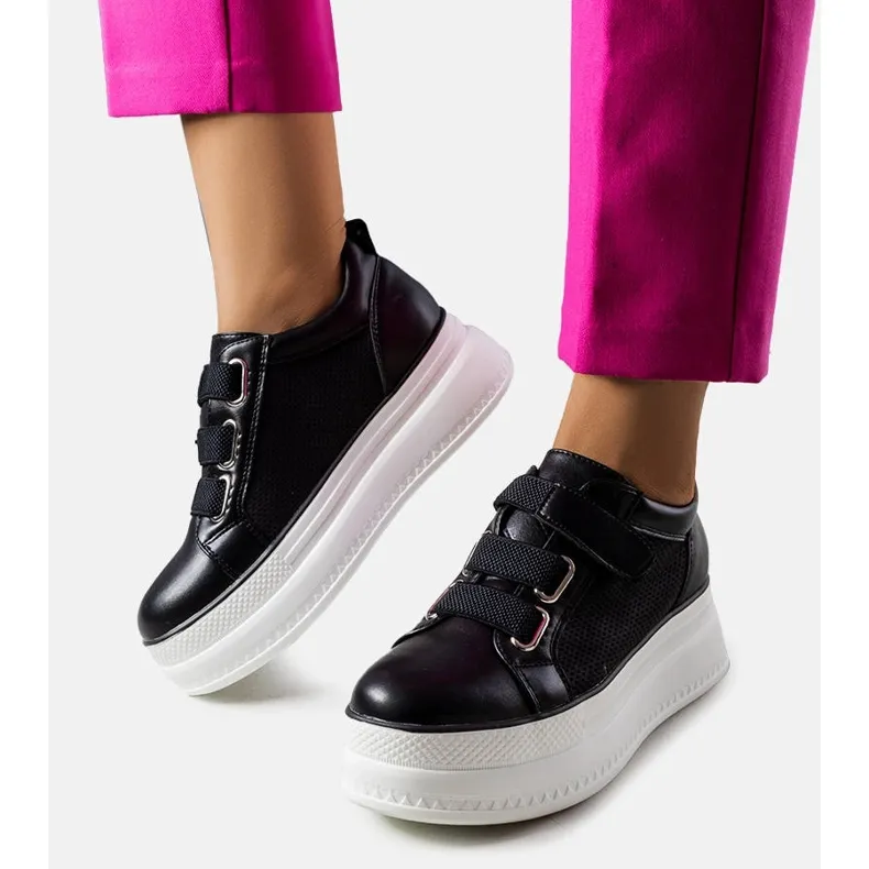 Black platform sneakers from Armina