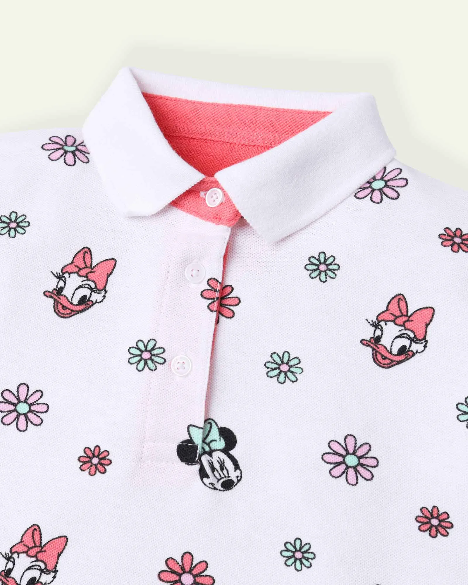 Cropped Polo Shirt with Flower Pattern.