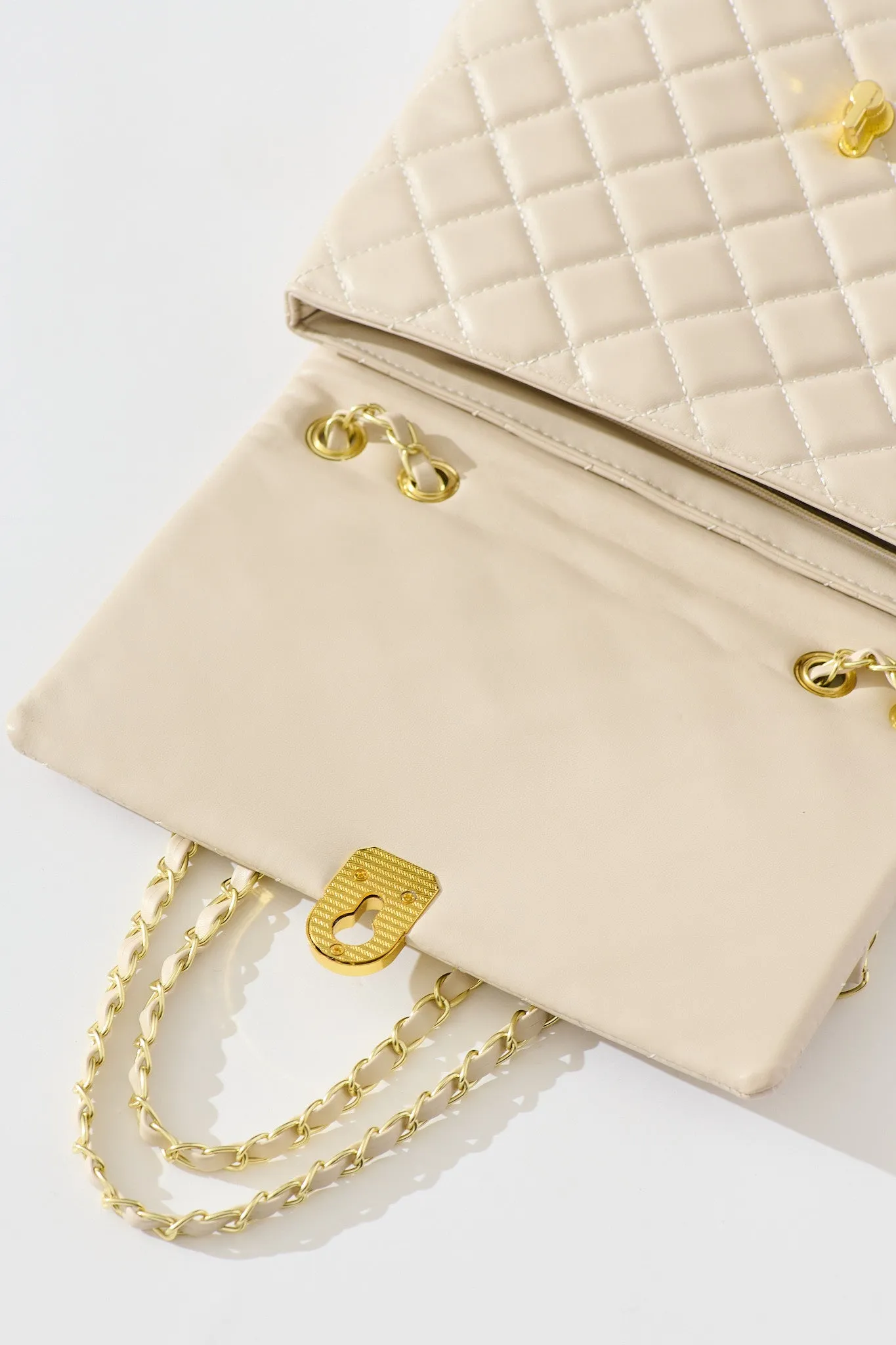 Eliza Quilted Crossbody Bag In Beige