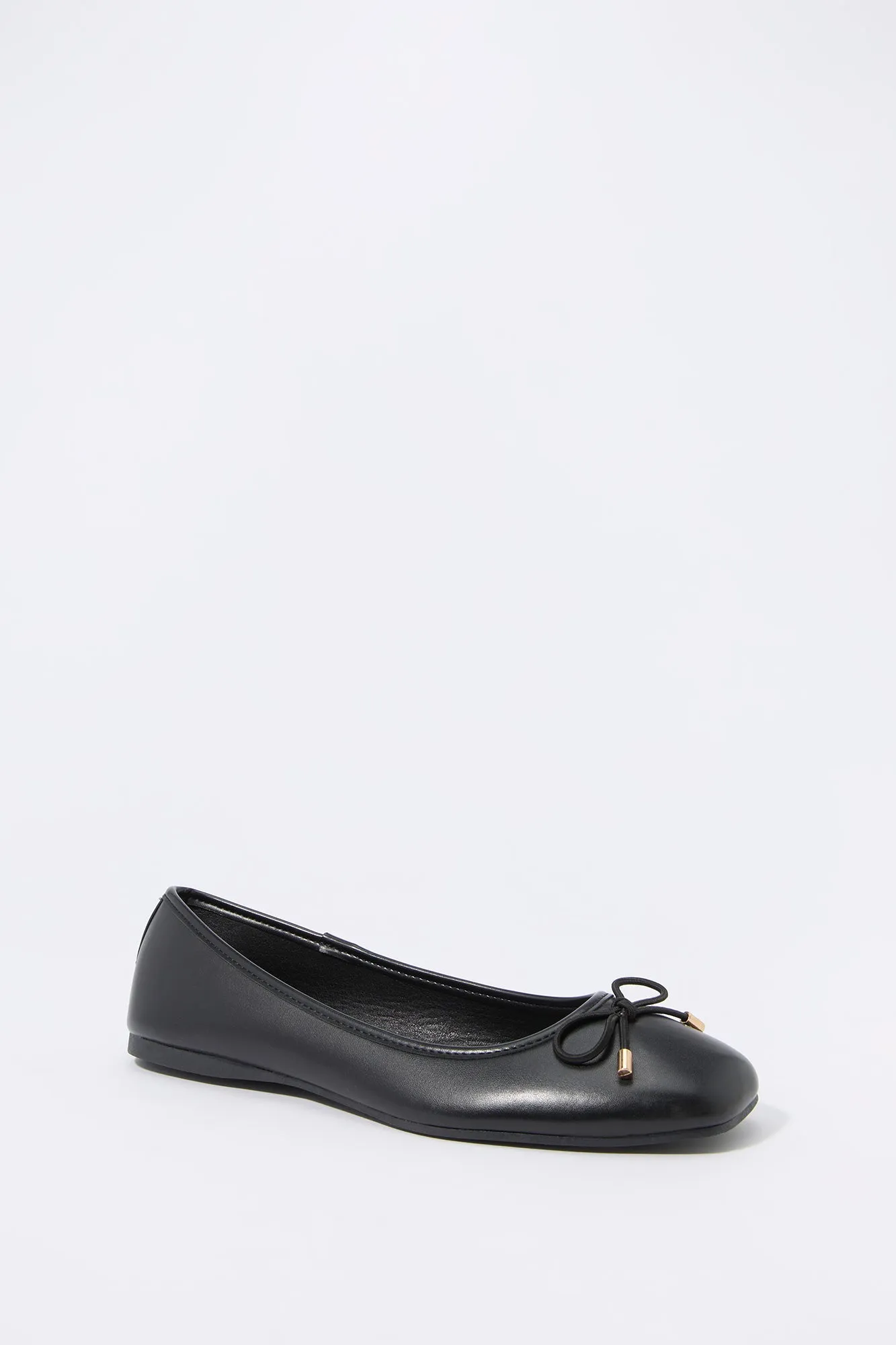 Faux leather ballet flats with buckles.