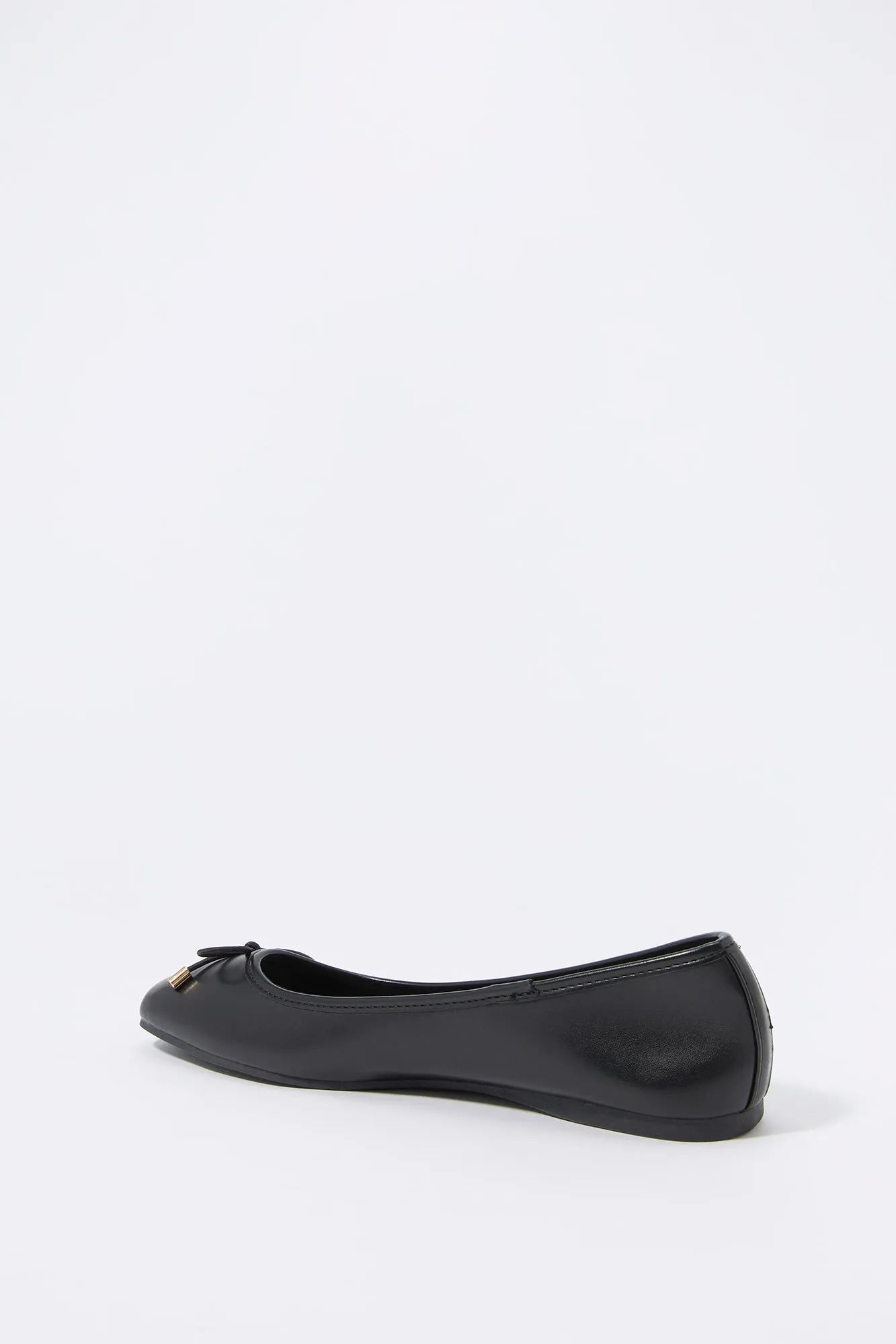 Faux leather ballet flats with buckles.