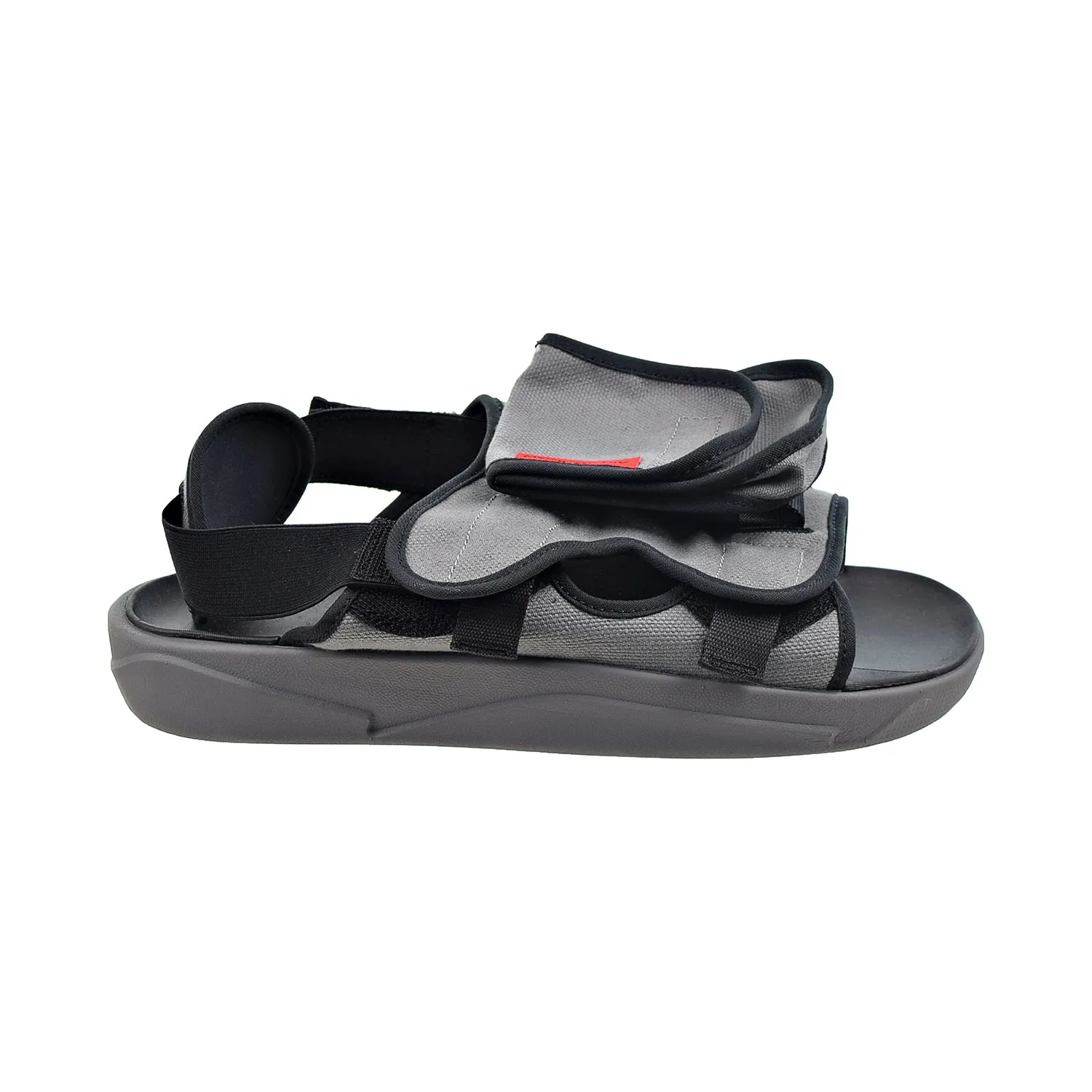 Jordan LS Slide Sandals in Smoke Grey and University Red.