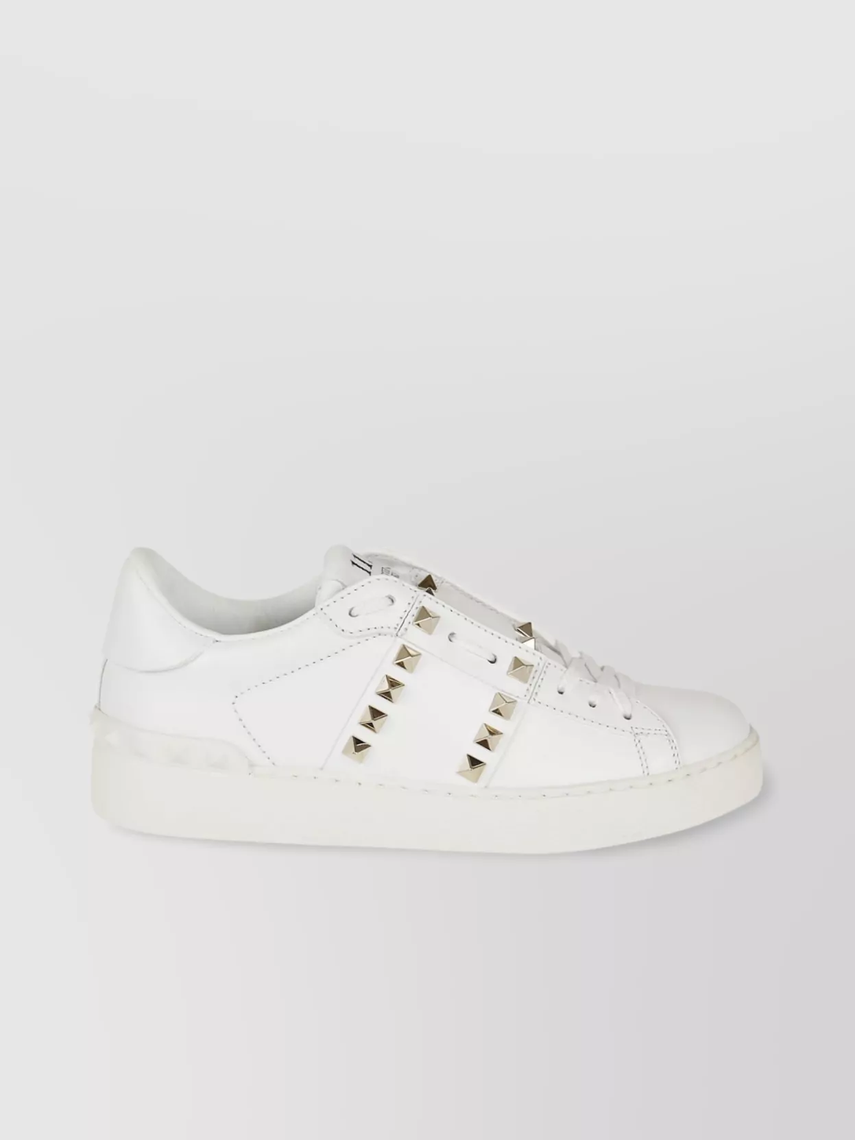 Valentino Garavani   Studded flat sole sneakers